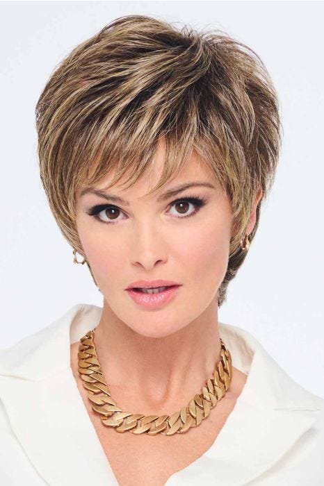 Woman in a long medium brown lace front pixie wig with wispy bangs