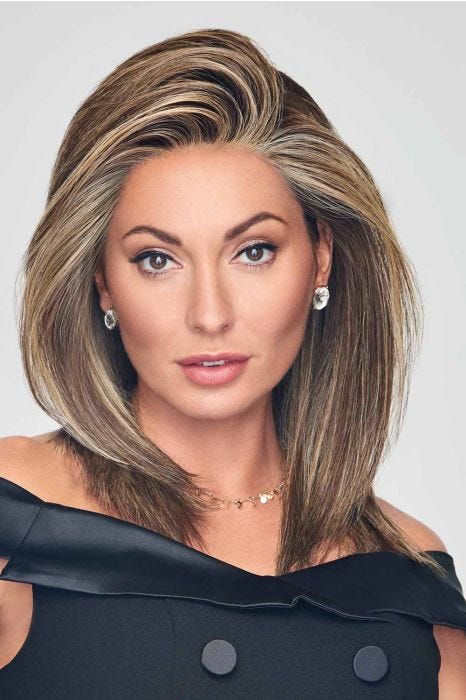 Woman in a past the shoulders dark brown lace front wig with long layers