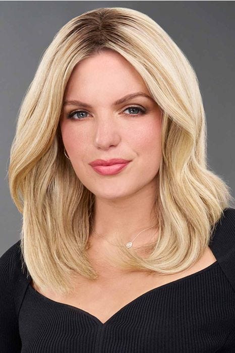 Woman in a 12" light blonde semi wavy human hair topper for thinning hair