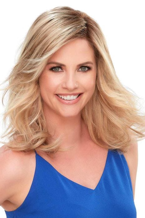 Woman in a 12" light blonde semi-curly lace front hair topper with side bangs