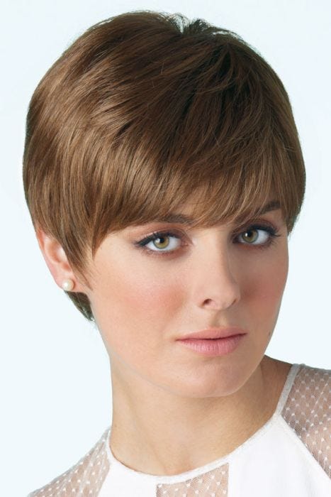 Woman in brown short pixie cut wig with layers and bangs