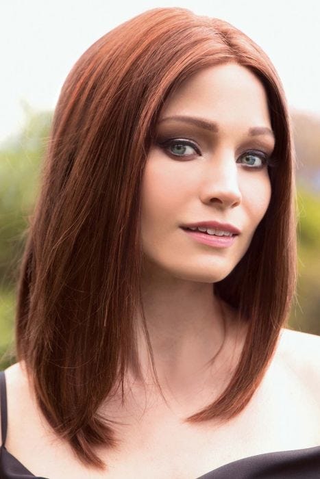 Woman in a deep red past the shoulders straight human hair wig