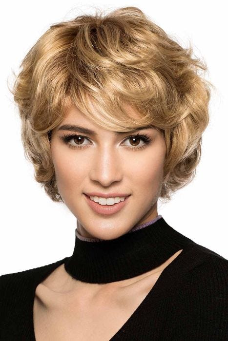 Woman in a shaggy short warm blonde bob wig with side bangs