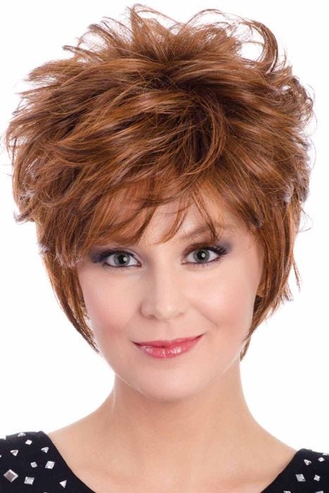 Woman in a long tousled medium red pixie wig