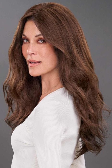 Woman in an 18" wavy brown hair topper wiglet for thinning hair