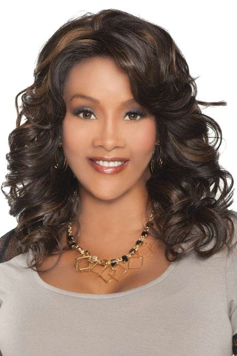 Afro American woman in a shoulder length dark brown and black curly lace front wig with side bangs