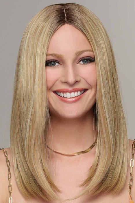 Woman in a past the shoulders straight medium blonde blunt cut wig