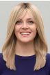 Woman in a 12" blonde hair topper for thinning hair