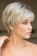 Woman in a platinum blonde semi-asymmetric short bob wig with a side part and side bangs