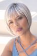 Woman in a chin length silver bob wig with fringe bangs
