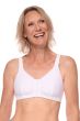 Woman in a white front closure bra for post surgery care