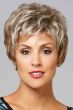 Woman in a long layered light blonde pixie wig with wispy bangs