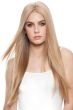 Woman in a 16" to 18" warm blonde human hair topper for thinning hair