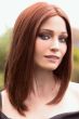 Woman in a deep red past the shoulders straight human hair wig