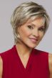 Woman in a close cropped ash blonde short lace front wig with wispy bangs