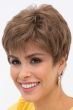 Woman in a light brown classic cropped pixie wig with textured bangs and defined sideburns