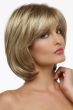 Woman in shoulder length highlighted blonde cropped bob wig with layers and curtain bangs