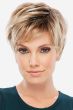 Woman in short light blonde pixie cut wig