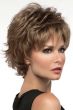 Woman in a wavy textured light brown pixie wig with longer piecey layers on top