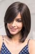 Woman in dark brown long bob wig with bangs