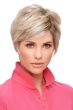 Woman in a light ash blonde asymmetrical pixie wig with long layers