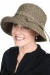 Woman in straw summer sun hat with wide upturned brim