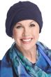 Middle aged woman in blue beret for cancer patients