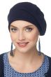 Woman in roomy navy blue cotton beret head covering