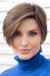 Woman in an edgy long asymmetric dark brown human hair/synthetic wig
