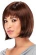 Woman in a blunt dark auburn chin length bob wig with short textured bangs