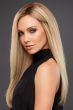 Woman in a petite extra long light blonde straight lace front wig