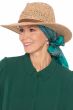 Woman in straw summer fedora hat with green silk head scarf underneath for women with cancer