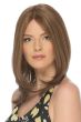 Woman in a past the shoulders golden brown middle part layered remy human hair wig
