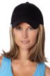 Woman in a solid black baseball cap with shoulder length golden brown hair attached