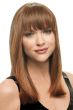 Woman with ginger brown blunt clip in bangs attached to her hair