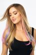Woman with long pink and blue hair extensions clipped to her hair