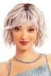 Woman in a chin length wavy ash blonde lace front wig with choppy bangs