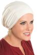 Woman in cream slip on hat for cancer patients