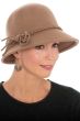 Woman in brown suede wool brimmed outdoor winter hat with braided detail for women with cancer