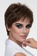 Woman in a textured dark brown pixie wig with wispy bangs