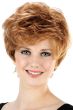 Woman in a long light auburn messy pixie wig
