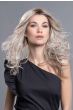 Woman in an extra long straight red to light blonde lace front wig