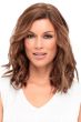 Woman in a 12" medium brown heat resistant hair topper for thinning hair