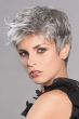 Woman in a grey pixie wig with longer tousled hair on top