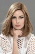 Woman in a 9" medium auburn straight hair topper for thinning hair