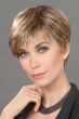 Woman in a classic light brown pixie wig with textured bangs