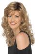 Woman in a past the shoulders curly blonde hair with side bangs