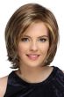 Woman in a shoulder length layered medium brown lace front bob wig