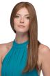 Woman in an extra long golden brown straight remy human hair wig