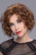 Woman in a chin length medium auburn curly lace front wig
